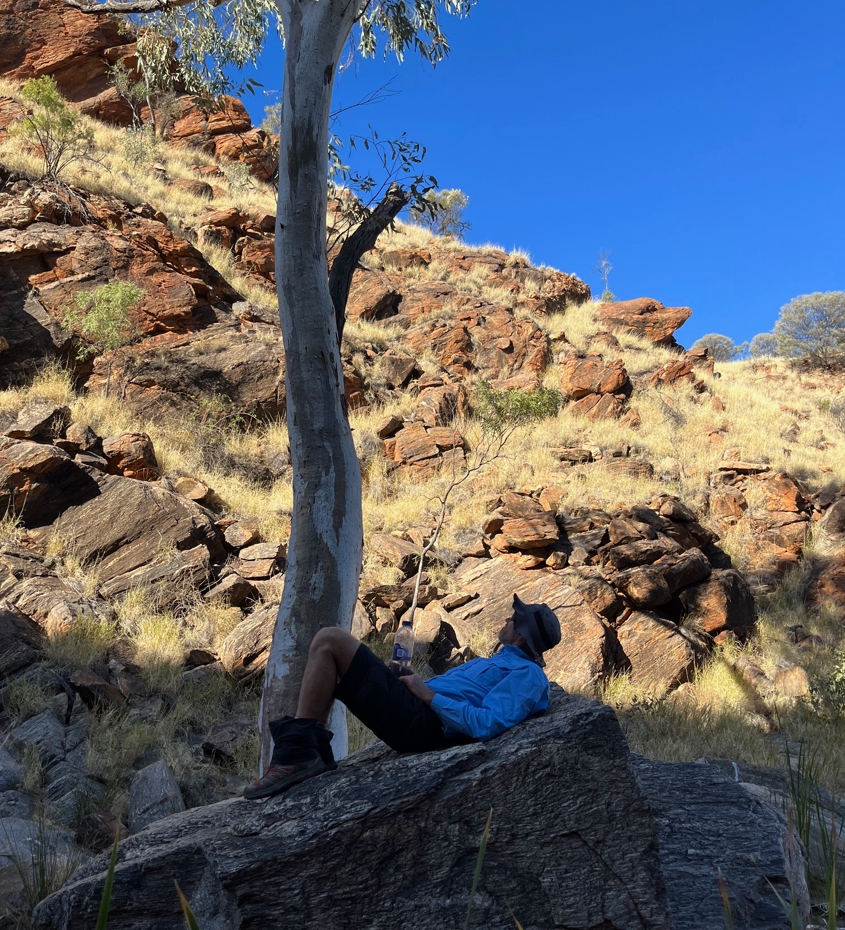 Fraser resting on a rock in Wallaby Gap.