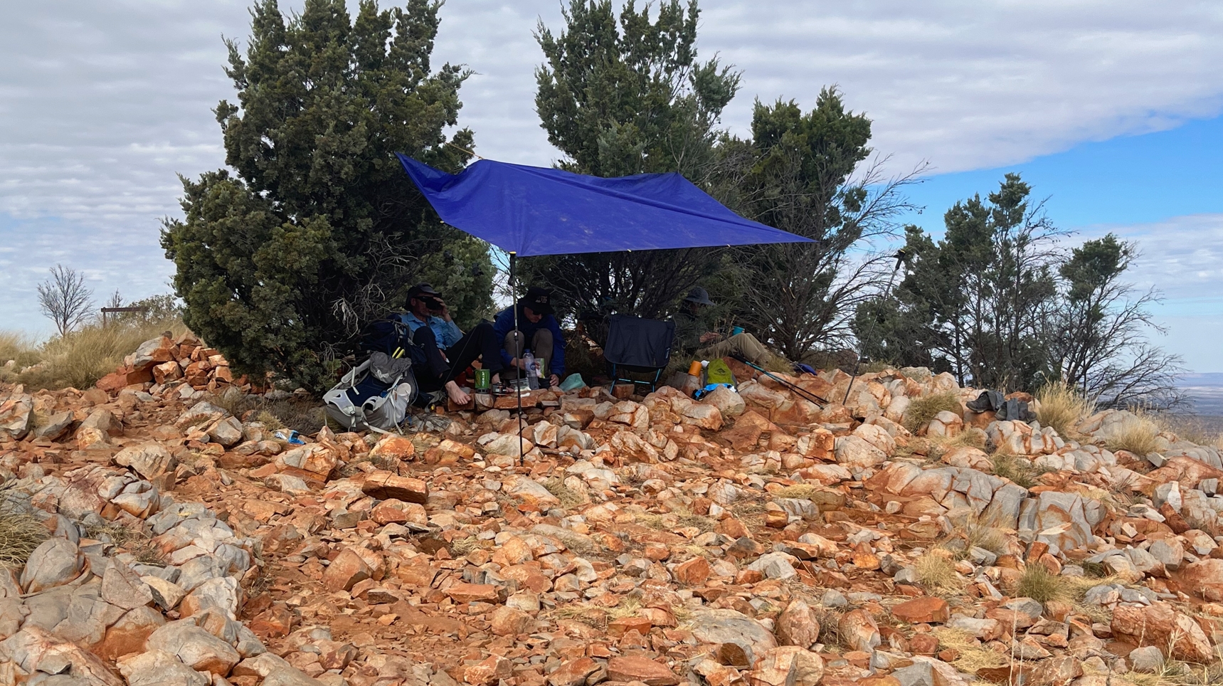 Gratefully ensconced under self manufactured shade at Counts Point.`