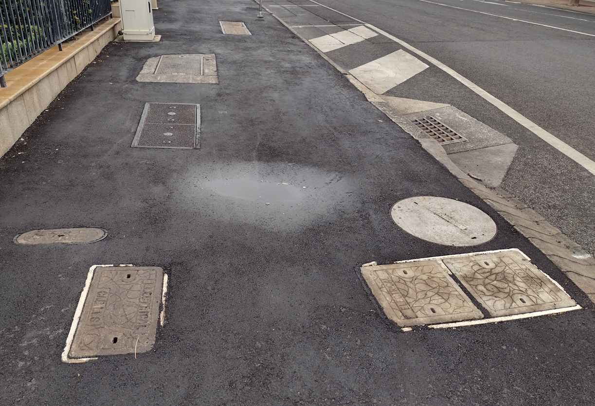 Manholes on Neil St